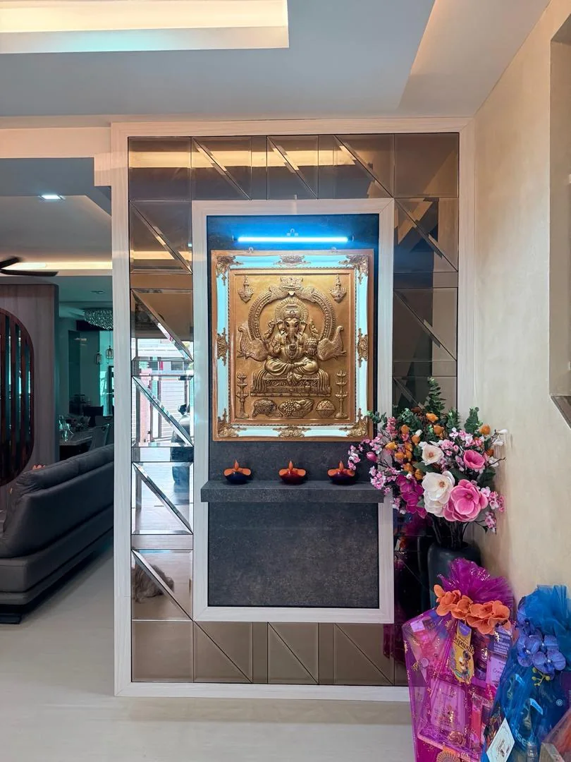 Completed residential interior featuring a custom prayer niche, wall panelling and built-in furniture
