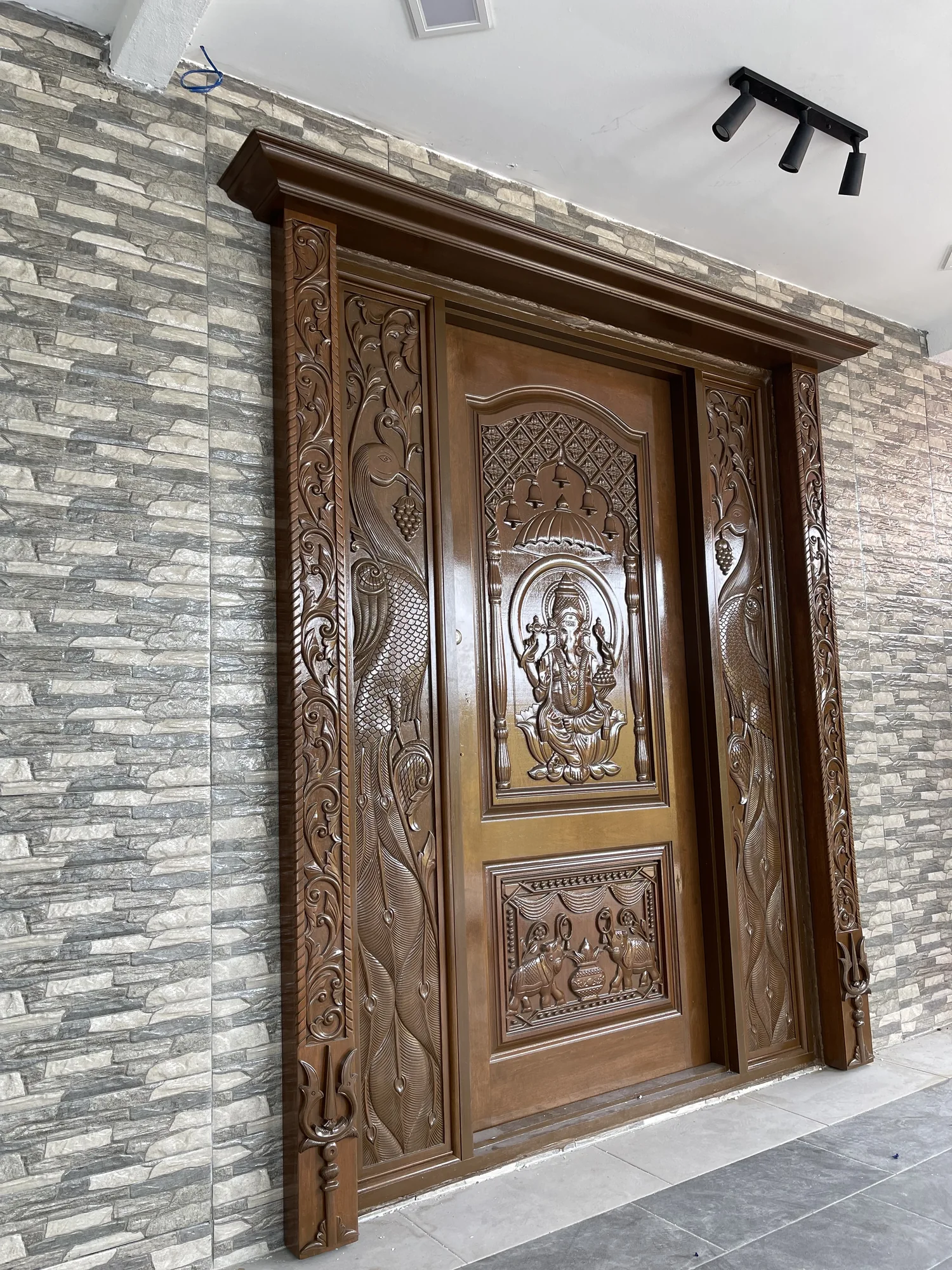 Detailed carved timber double entrance door