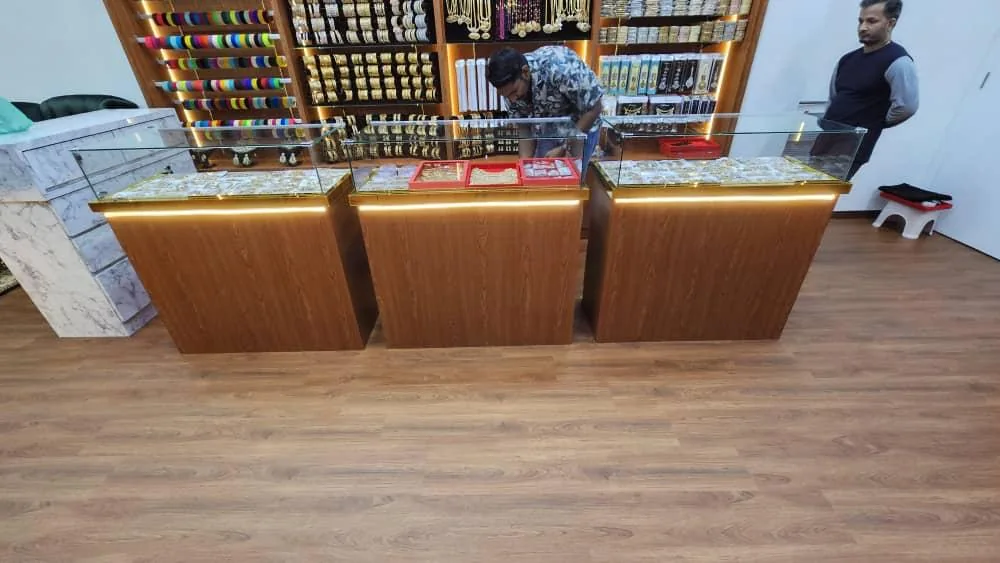 Jewellery retail counter with illuminated glass display cases